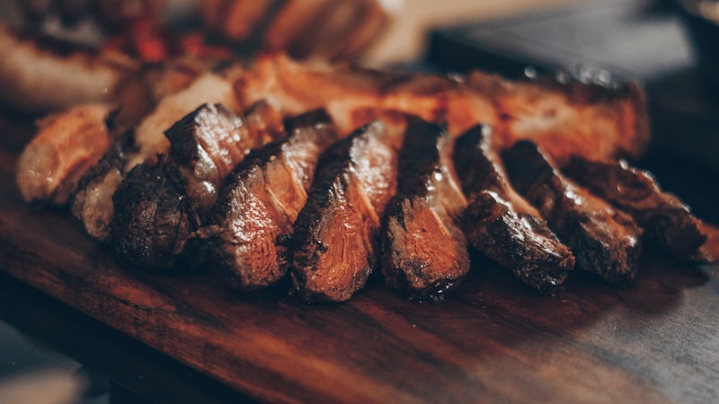 Premium fresh beef cuts on a wooden board